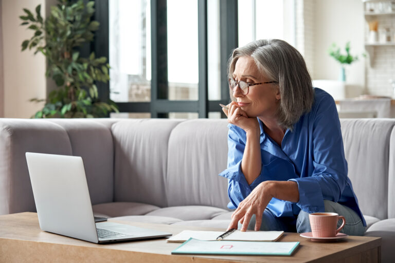 woman researching cost of a good facelift near Georgetown