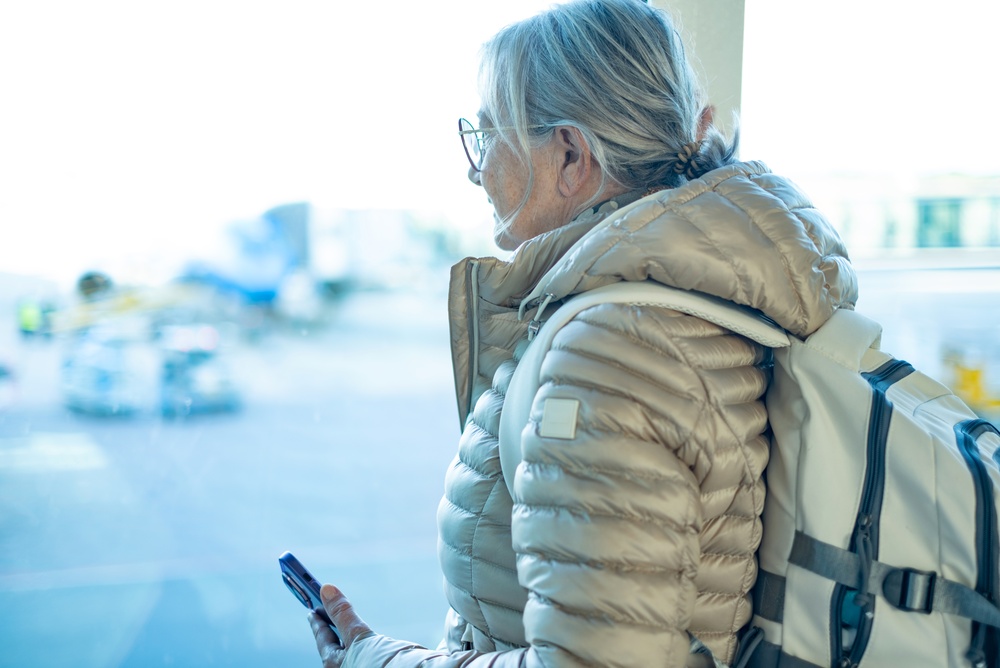 woman about to travel to DC for facial plastic surgery with Dr. Hopping