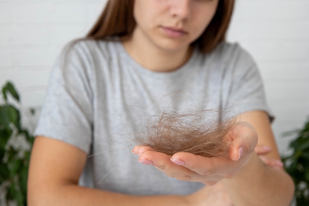 woman with hair loss that is no longer normal