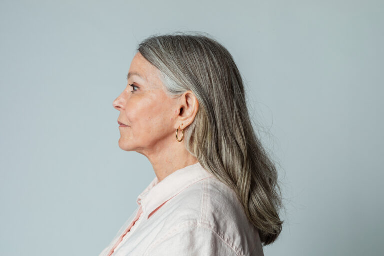 side profile of a woman after rhinoplasty in DC